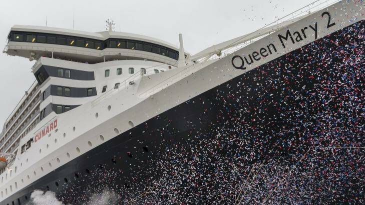 Confetti helps celebrate the launch of Cunard's Queen Mary 2 after a $177 million refit. Photo: Christopher Ison