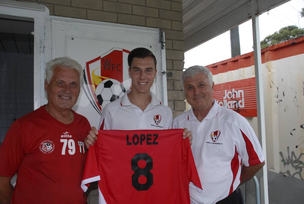 Former Socceroos' coach Rale Rasic (left) and Warilla Wanderers' president Manuel Luna (right) with Wanderers' player Jeremy Lopez. Picture: PHIL McCARROLL