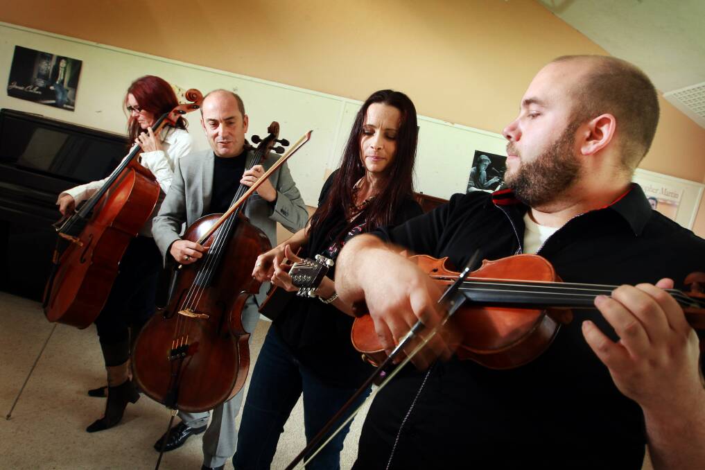 Steel City Strings musicians Karella Mitchell, Ilir Merxhushi, Rebecca Moore and Kyle Little will perform a concert at Wollongong Art Gallery on May 9. Picture: SYLVIA LIBER