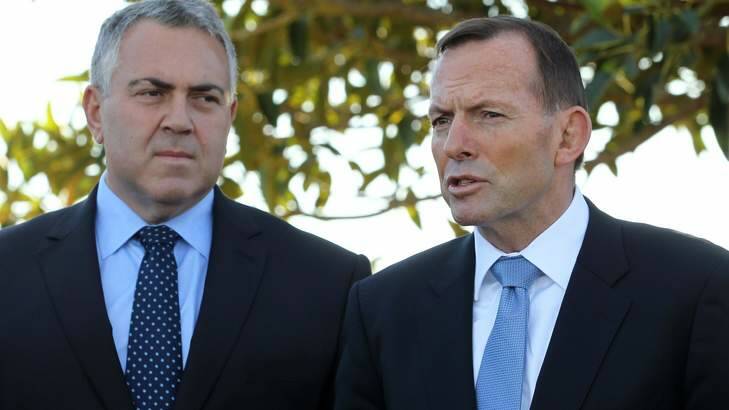 Prime Minister Tony Abbott and Treasurer Joe Hockey. Mr Abbott says Clive Palmer should respect the government's mandate and pass the budget. Photo: Jonathan Ng