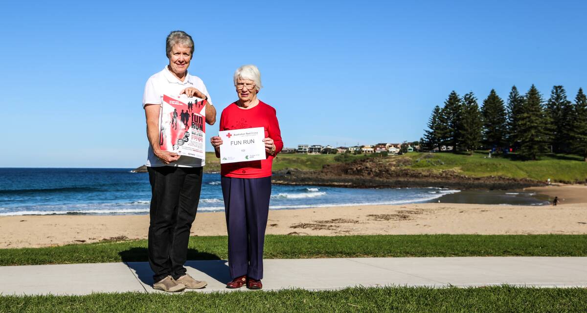 Kiama Red Cross Branch treasurer Judi O'Brien with Heather Shepherd, who was the first person to register for next month's Red Cross Centenary Fun Run. Picture: GEORGIA MATTS