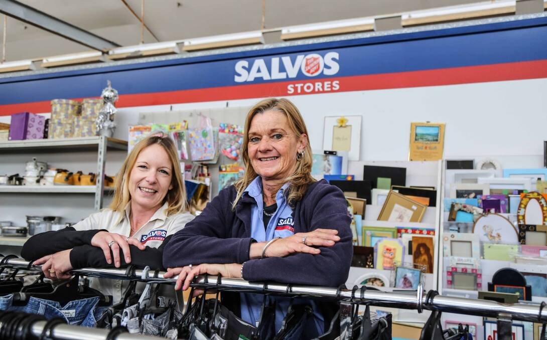 Warilla Salvation Army Store Manager Tennille Round and employee Leanne Hall are preparing for Op Shop Week, which includes a 50 per cent-off sale. Picture: GEORGIA MATTS