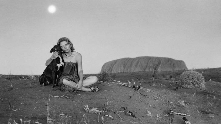 A black and white photo of Robyn Davidson at Uluru, first printed in 2014. Photo: Rick Smolan