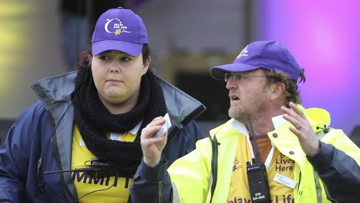 Music Makers? Melissa Tierney and Kiama Relay for Life's Michael Innes work out the logistics for some of the entertainment at Kiama's Relay for Life. Picture: DAVID HALL