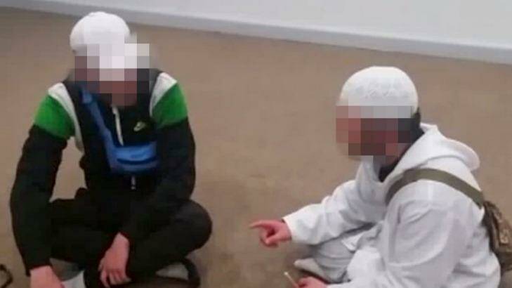 One of the boys, in white, uploaded videos of him converting other young people to Islam. Photo: Facebook