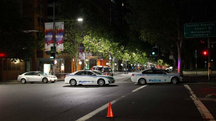 Police at the scene of the shooting of Michael Ibrahim on Macquarie Street on Sunday night.  Photo: Kate Ausburn