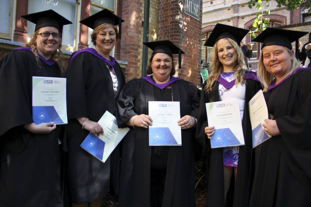 TAFE Illawarra Shellharbour students graduate in Early Childhood education. From left, Katherine Herbert, Leanne Harris, Esterina Lappos, Alice Peters and Tammy Monagle.