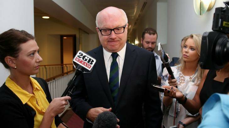 Attorney-General Senator George Brandis says journalists are not the target of the government metadata retention plans. Photo: Alex Ellinghausen