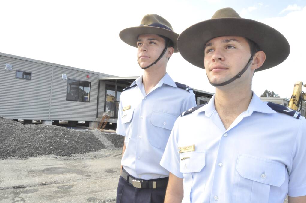 Cadets from the Shellharbour City 338 Squadron, Maxwell Brooks and Joseph Timpano look forward to moving into their new home at Illawarra Regional Airport. Picture: ELIZA WINKLER