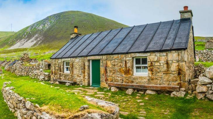 A renovated stone cottage among the village ruins on Hirta.  Photo: fotoVoyager