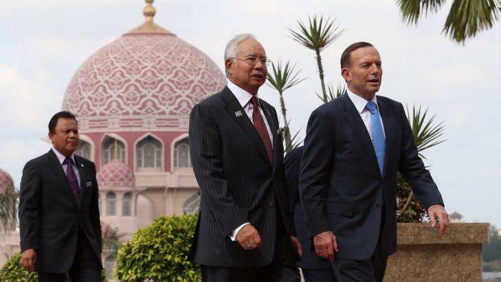 Prime Minister Tony Abbott was greeted by Malaysian Prime Minister Najib Razak in Kuala Lumpur in September last year.  Photo: Andrew Meares