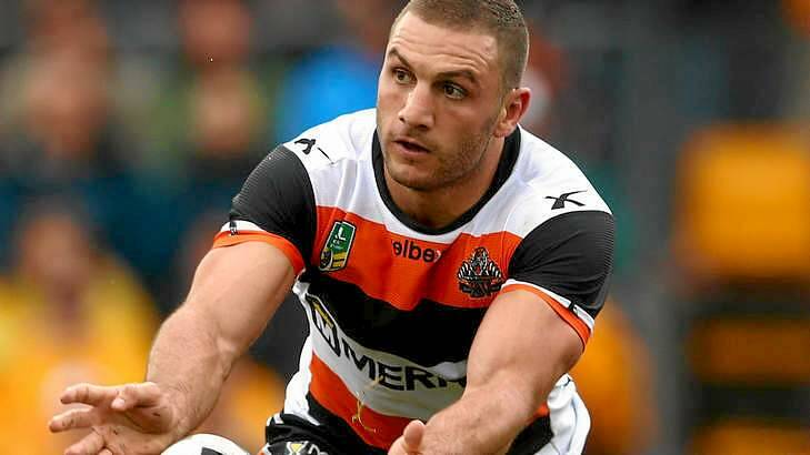 Big loss: Wests Tigers' inspirational hooker Robbie Farah is out with a dislocated elbow. Photo: Cameron Spencer