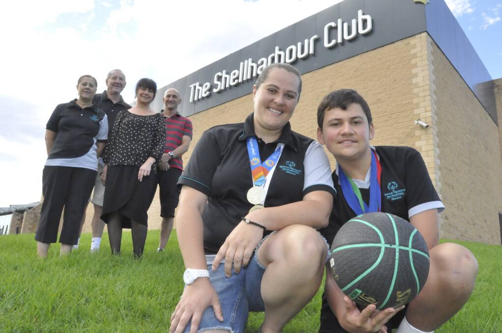 The Shellharbour Club is in the running to win Club of the Year in the Sports category. Pictured are Maria Keen, Richard Keen, Shellharbour Club chief executive Debbie Cosmos and Colin Mckay with Illawarra Special Olympics athlete representative Lisa Keen and Sean Mckay. Picture: ELIZA WINKLER