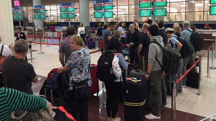 Passengers queue in hope of return to Sydney at Dubai International Airport Photo: Mia Parkes-Talbot