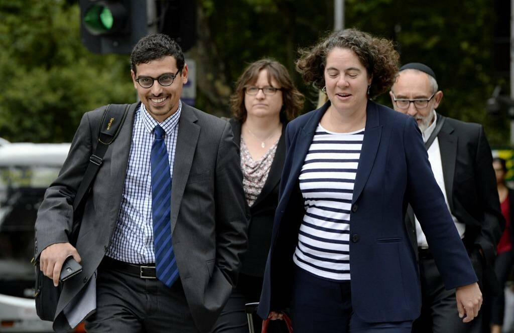 Manny Waks and his team including his Dad Zephaniah Waks (right) arriving at the County Court, Melbourne, where he's appearing at the Royal Commission into child abuse. Photo: Penny Stephens