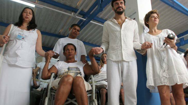 A wheelchair-bound patient waits to see Joao de Deus. Photo: Tim Elliot