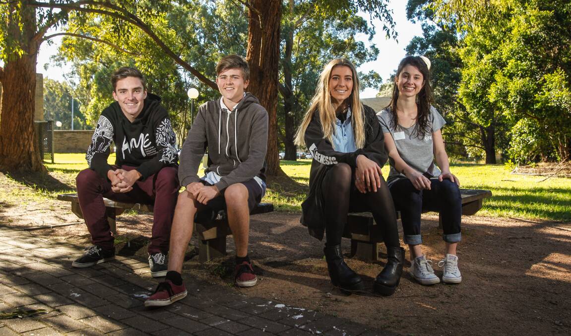 AIME participants at UOW: mentor Liam Crook (left), Kiama High student Harry Jones, his sister Chelsea, and mentor Jessica Hinde. Picture: CHRISTOPHER CHAN