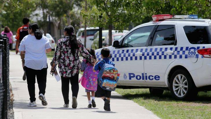 Police at Aitken Creek Primary School in Craigieburn, Melbourne, on February 2. Photo: Wayne Taylor