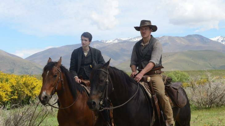 Kodi Smit-McPhee (left) with Michael Fassbender in the 2015 western <i>Slow West</i>.