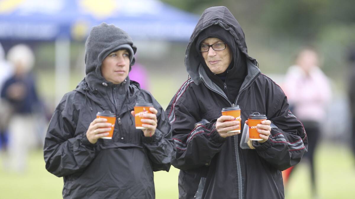All rugged up and walking for a good cause ? this couple had the right idea to try and beat the cold at Saturday?s Relay for Life with their warm weather gear complimented by a cup of coffee in both hands. Picture: DAVID HALLKPC68690.JPG
