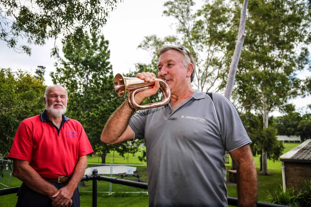 Richard Hoskins and Warwick Sporne with historic WWI bugle. Picture: GEORGIA MATTS