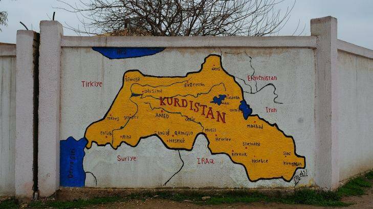 Map of Kurdistan hand-painted on a wall in the main city of Qamishli, in Rojava, north-eastern Syria.  Photo: Fadi Yeni Turk
