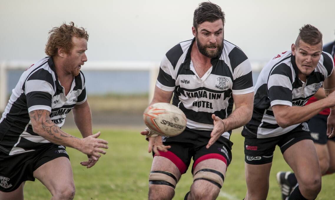 Leighton Cowley offloads to Jacob Riwai-Couch while Mick Kauter backs up on the inside during Kiama Cows' big won over Bowral. Picture: LINDA FAIERS
