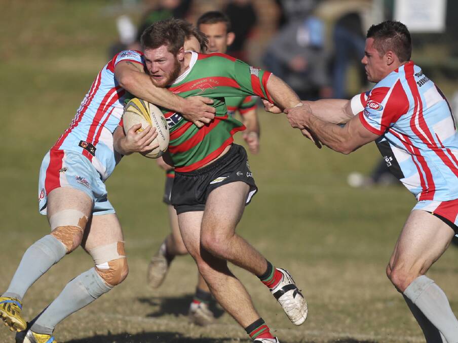 Jamberoo Superoos centre Josh Saunders tries to break through the Milton-Ulladulla defence during Sunday's clash at Kevin Walsh Oval. Picture: DAVID HALL