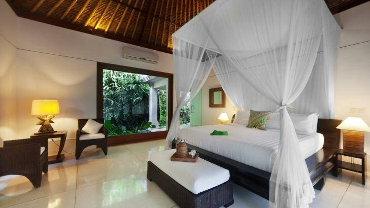 A luxury bedroom at Villa Mawar.
