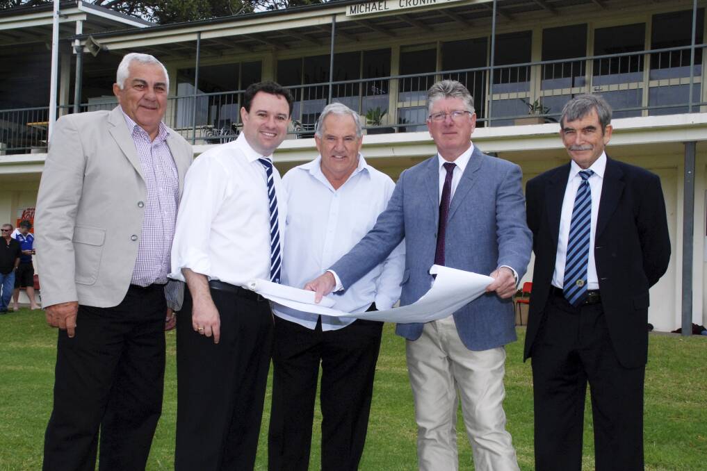 Country Rugby League president John Anderson, NSW Minister for Sports and Recreation Stuart Ayres, Gerringong Lions first grade coach Michael Cronin and president Darryl Hobbs with South Coast Group 7 president Roy Mills checking over the plans for the new extensions to the Gerringong clubhouse. Picture: DAVID HALL
