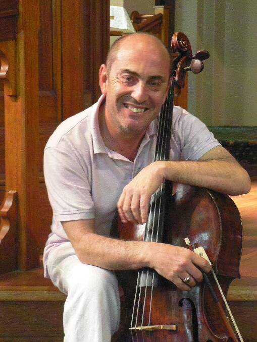 Ilir Merxhushi with his David Tecchler cello, which he will play at Illawarra Choral Society.