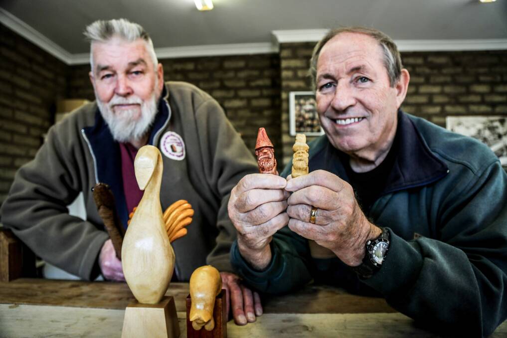 Ted Furlong and Frank O'Connor from the Shellharbour Woodcarvers. Picture: GEORGIA MATTS