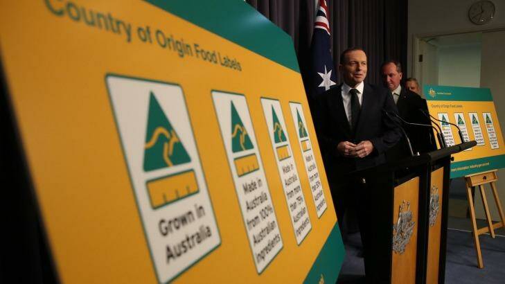Prime Minister Tony Abbott Agriculture minister Barnaby Joyce and Industry minister Ian Macfarlane announce the new labels. Photo: Andrew Meares