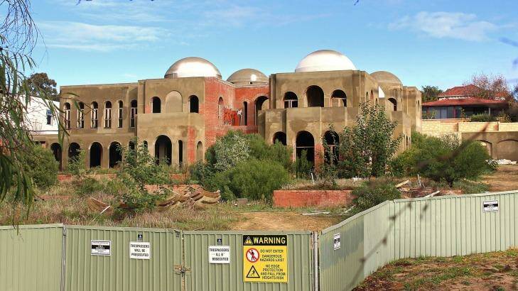 The Oswals ploughed millions into their expansive residence in Perth's ritzy suburb Peppermint Grove. Photo: Jonathan Barrett