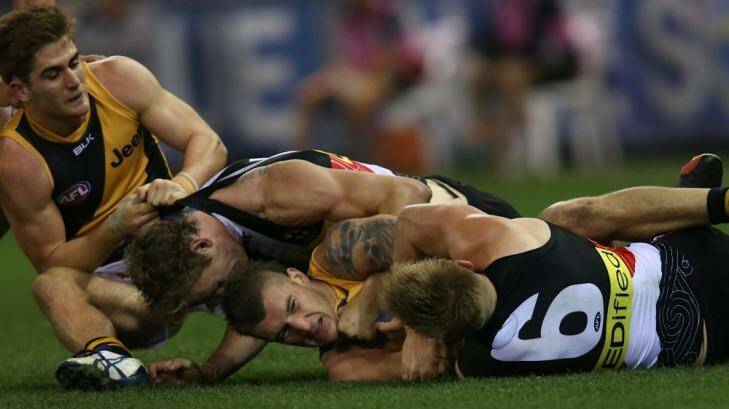 A third quarter melee involving Anthony Miles , Jimmy Webster , Dustin Martin and Sebastian Ross  Photo: Pat Scala