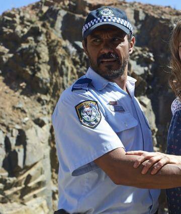 New ground: Lucy Lawless as Alex Wisham in the code, with Aaron Pedersen as Tim Simons.