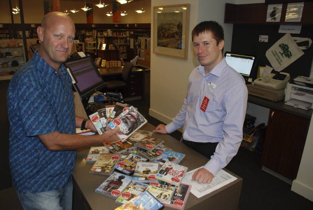 Gerringong Pics and Flicks president Charles McCammon and Kiama Library outreach services library officer Michael Dalitz. Picture: KERRIELYN CLARK