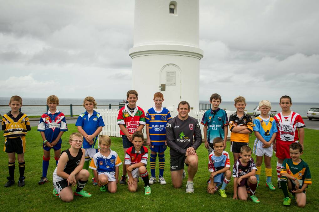 Former Kiama Knights junior league and now Australian star Brett Morris joined players from each team in the South Coast area for a photo at Kiama's Blowhole Point last week in preparation for the 2014 season, which kicks off on Saturday. Picture: ALBEY BOND