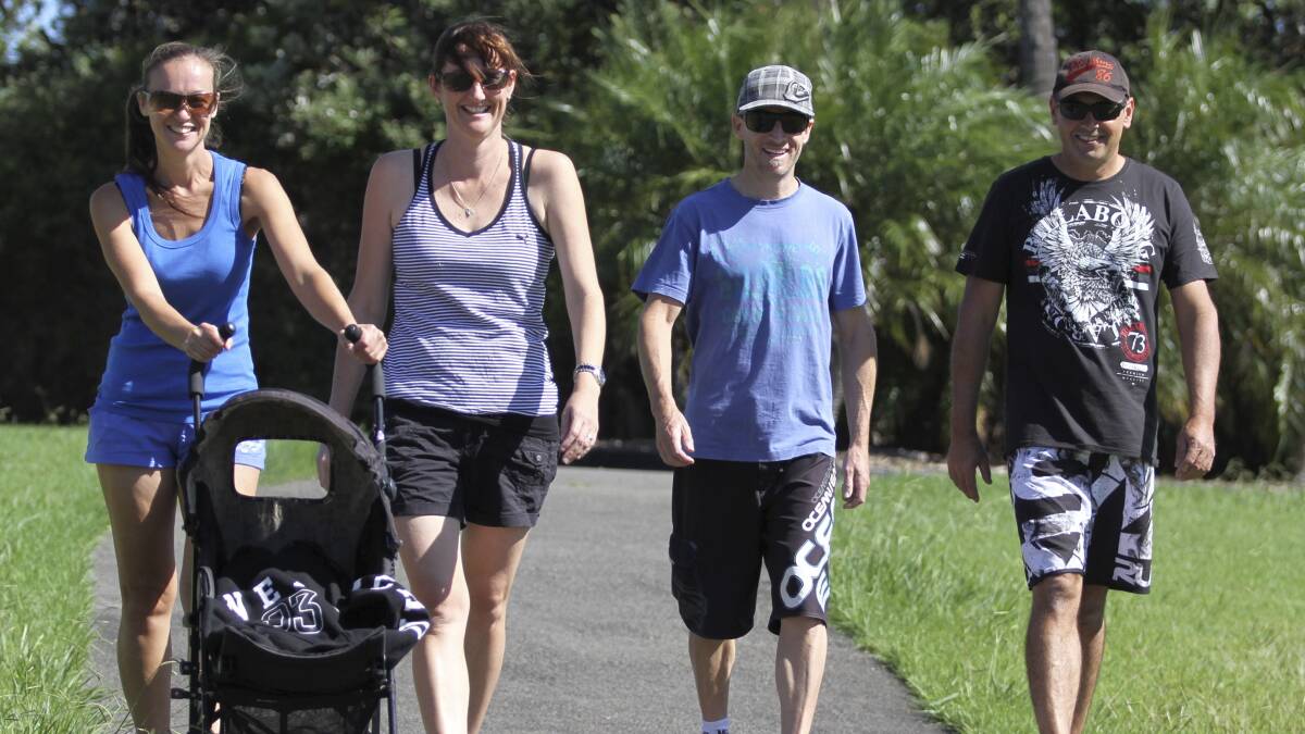 Melissa Dos Santos, Amanda Klenke and Anton Klenke and Michael Markovic getting in some practice for this weekend's Shell Cove Walk or Run for Fun. Picture: DAVID HALL