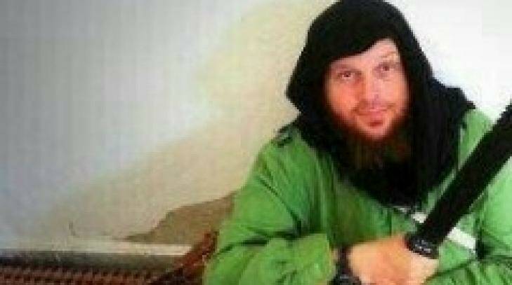 Kiwi jihadi Mark Taylor posing with a knife in Syria.