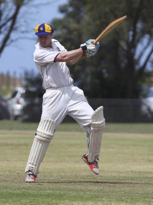 Dashing Kiama Cavaliers batsman Liam Anderberg plays a slashing cut shot for four during his innings of 69 against Shellharbour on Saturday. Picture: DAVID HALL