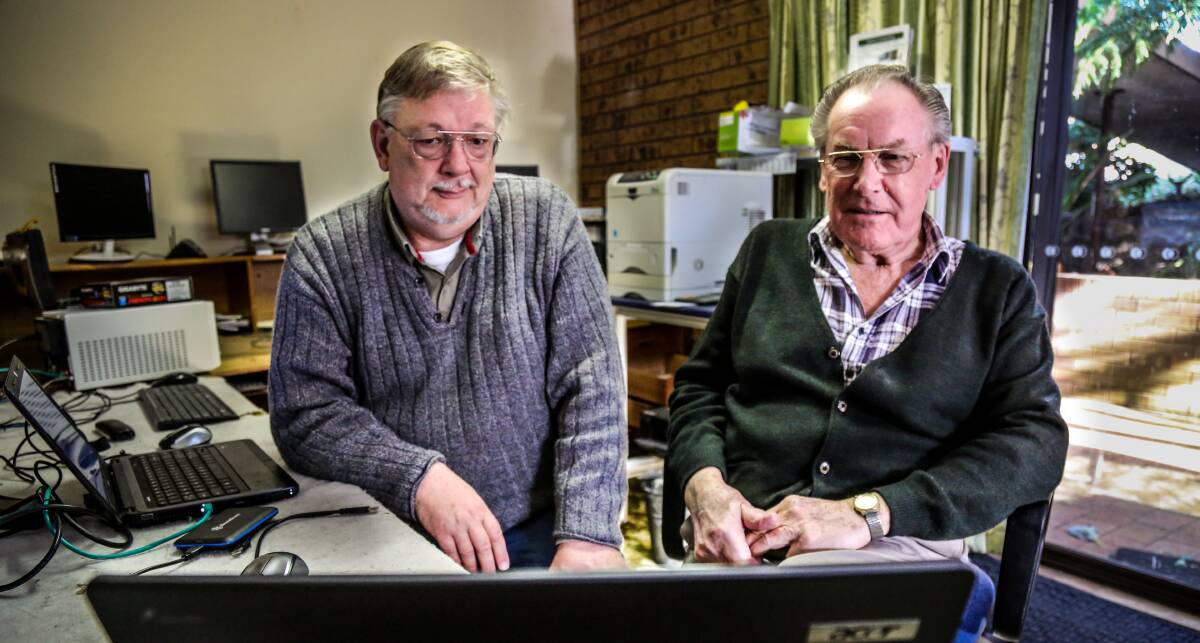 Edwin Humphries with one of his clients, Graham Harmer, who became a cyber victim. Picture: GEORGIA MATTS