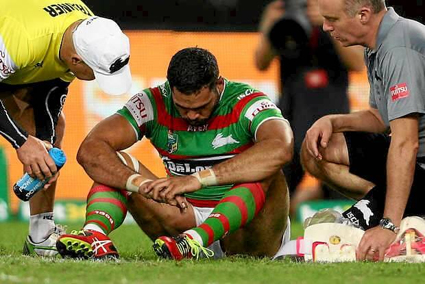 SYDNEY, AUSTRALIA - MARCH 21:  Greg Inglis of Souths is injured in a tackle during the round three NRL match between the Wests Tigers and the South Sydney Rabbitohs at ANZ Stadium on March 21, 2014 in Sydney, Australia.  (Photo by Renee McKay/Getty Images) Photo: Renee McKay