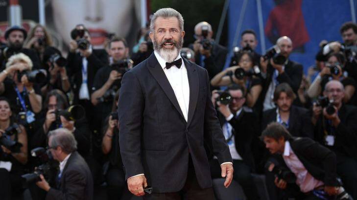 Director and actor Mel Gibson poses as he arrives on the red carpet for "Hacksaw Ridge" at the 73rd annual Venice International Film Festival, in Venice, Italy, Sunday, Sept. 4, 2016. (Claudio Onorati/ANSA via AP) Photo: CLAUDIO ONORATI/AP