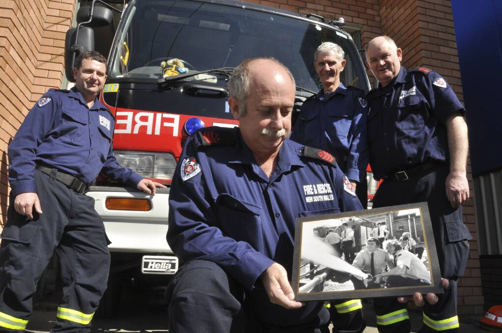 Albion Park Fire Brigade's retained fire-fighters Leonard Long, Rodney Fielder, Paul Long and Robert Orr (captain) reflect on some memories cultivated at the station that opened 40 years ago, as they prepare to move into an upgraded facility at Albion Park Rail. Picture: Eliza Winkler