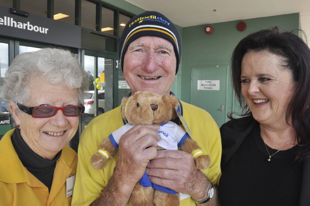 Cancer Council volunteers Helen Bent and Noel Dare with Shellharbour MP Anna Watson at the Woolworths at Shellharbour City. Picture: Eliza Winkler