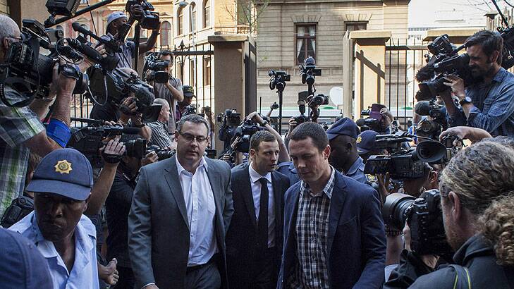 Scenes of chaos outside court as Oscar Pistorius arrived earlier today. 