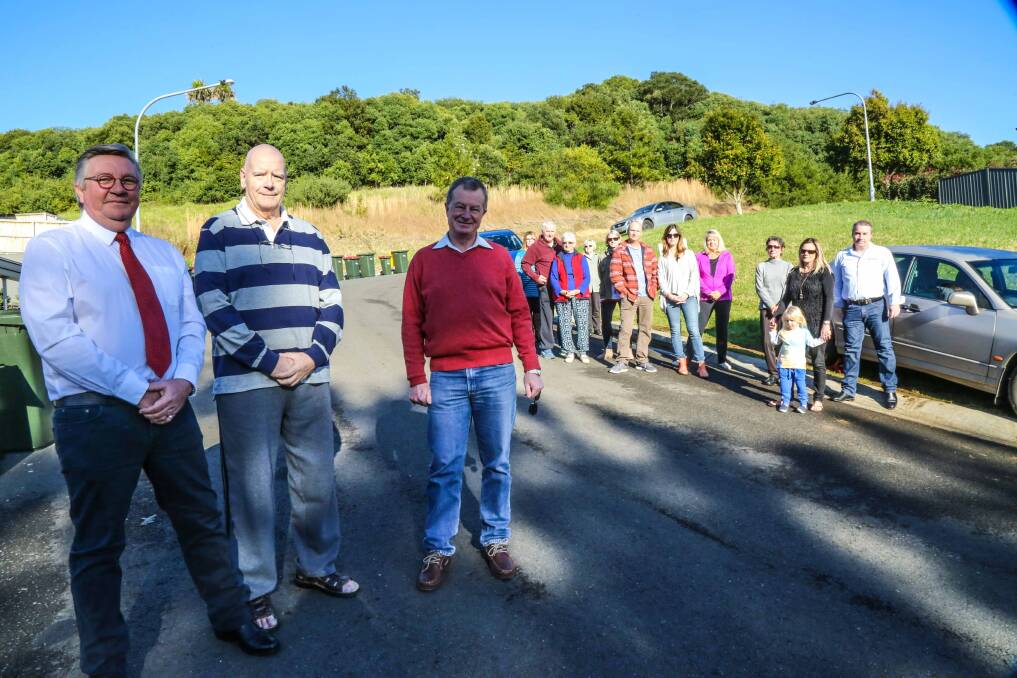 Kiama councillor Neil Reilly and residents Michael Yalden and Lee Cordner have called for the investigation of another access point for Cedar Grove Stage Two. Picture: GEORGIA MATTS