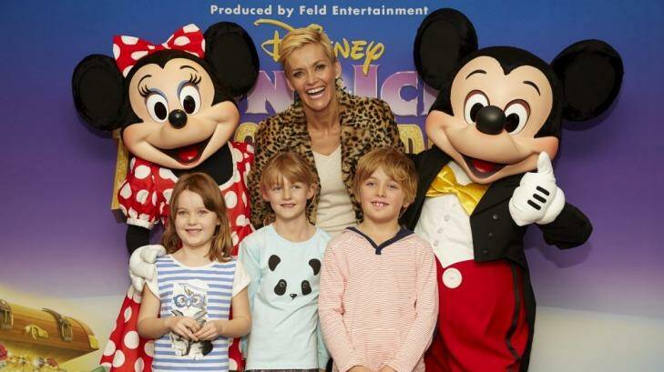Jessica Rowe with daughters Allegra and Giselle and friend. Plus Mickey and Minnie at Disney on Ice.  Photo: Dean Hammer