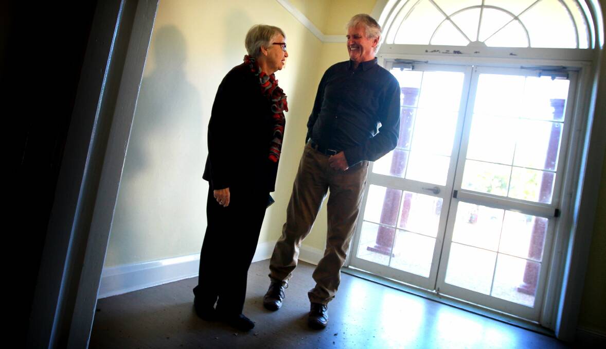 Gerringong Historical Society's Margaret Sharpe and South Precinct chairman Darrell Clingan in the town hall, which is undergoing a significant upgrade. Picture: SYLVIA LIBER